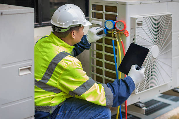 Professional Hvac technician working in Old Orchard Beach, ME